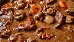 Easy Beef Bourguignon with red wine sauce and vegetables
