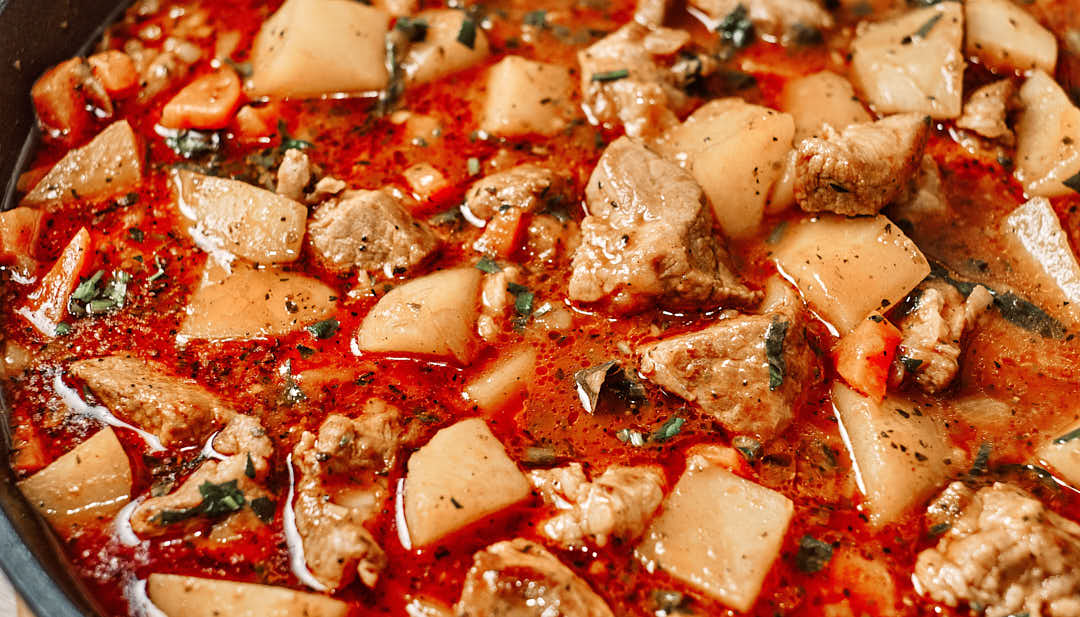 Close-up of tender pork and potatoes