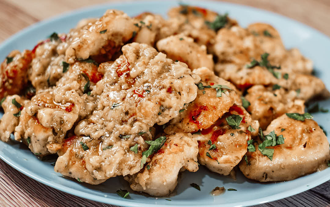 Juicy garlic butter chicken bites served with fresh parsley