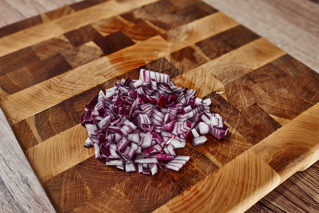 Chopped red onion for keto chicken salad