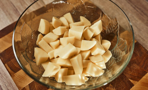 Chopped potatoes for cheesy soup
