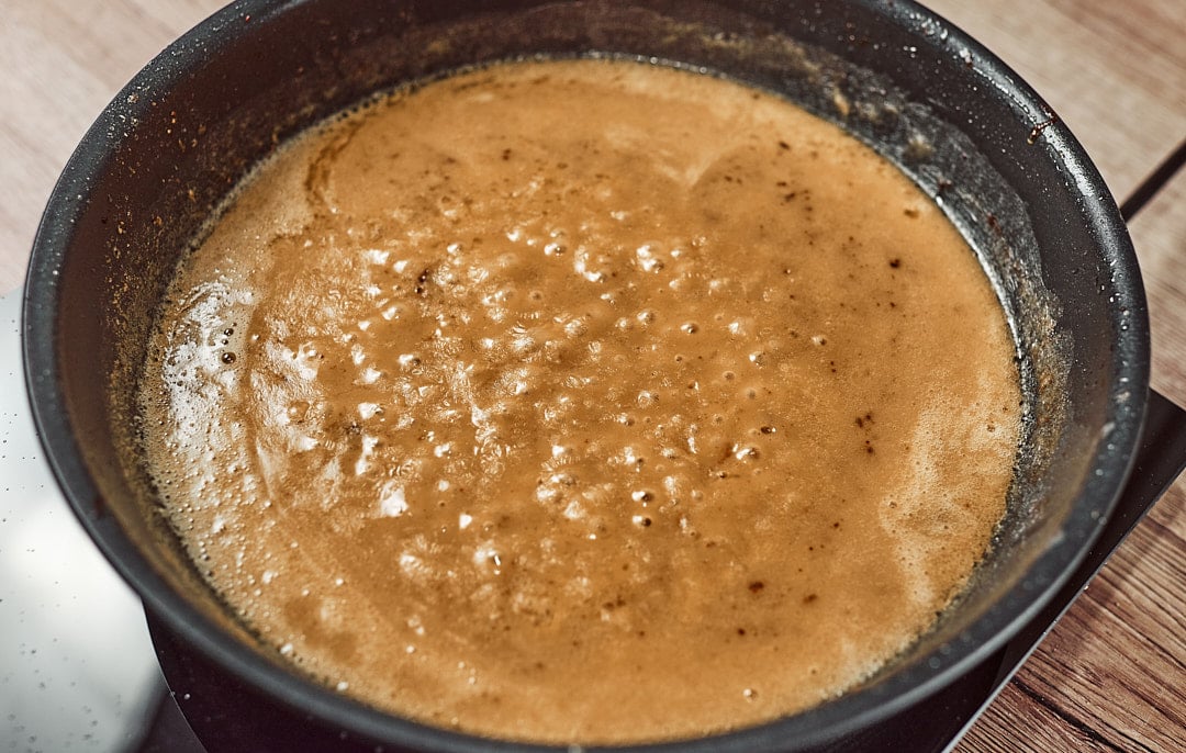 Adding beef broth to roux for meatball sauce