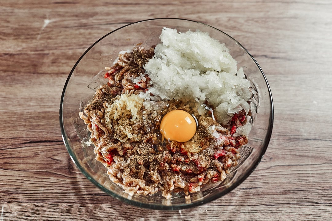 Adding egg for meatballs