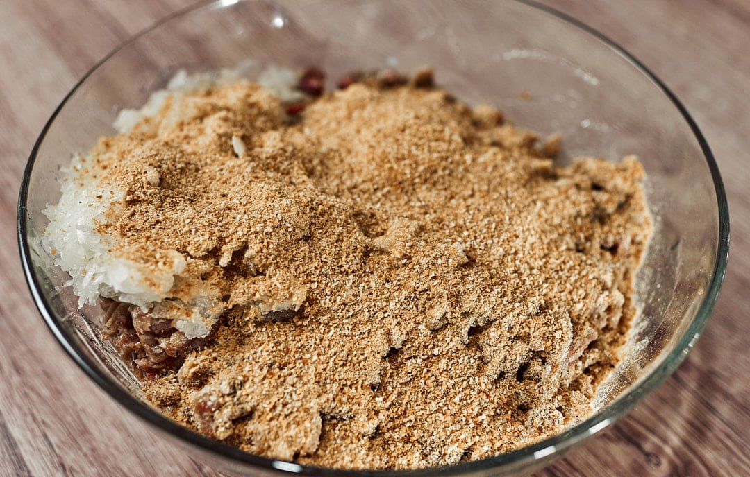 Adding breadcrumbs  for meatballs