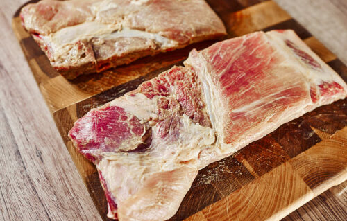 Mustard binder and dry rub on pork ribs