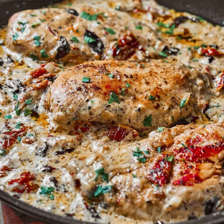Chicken breasts in creamy sauce ready to serve