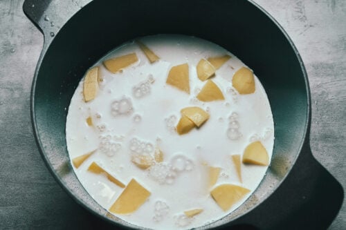 Potatoes covered with cream mixture