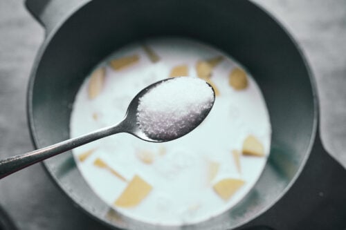 Salt added to potatoes in cream