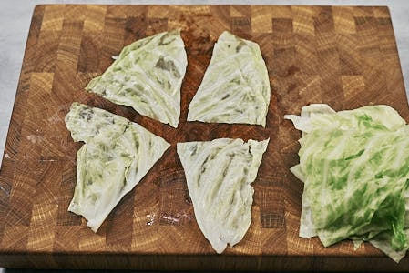 Cabbage leaf cut into smaller sections for cabbage rolls.