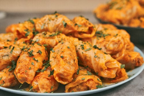 Easy stuffed cabbage rolls with rice, beef, and pork served on a plate