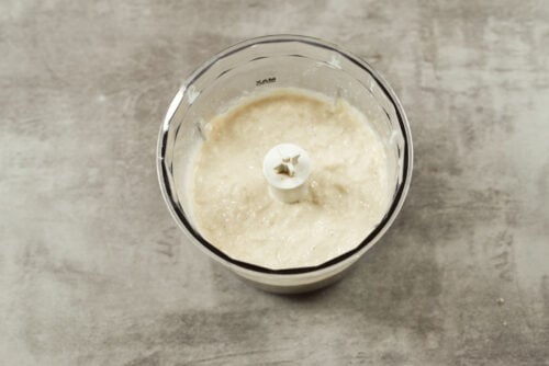 Blended bread and onion mixture for creamy chicken meatballs