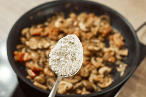 Flour added to mushrooms to thicken the sauce