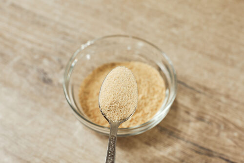Garlic powder added to breadcrumb mixture