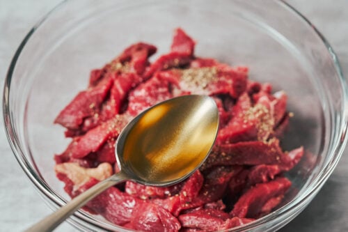 Adding oil to beef before cooking beef stroganoff