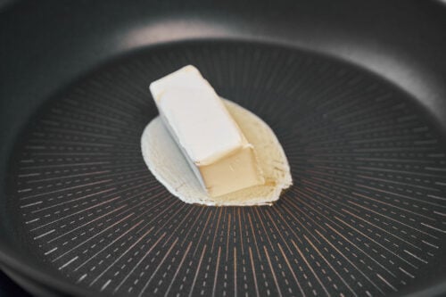 Melting butter in a skillet for beef stroganoff