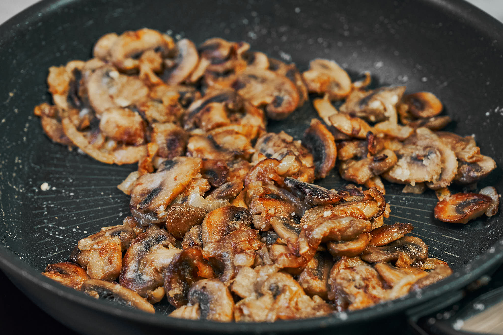 Mushrooms coated with flour for beef stroganoff sauce