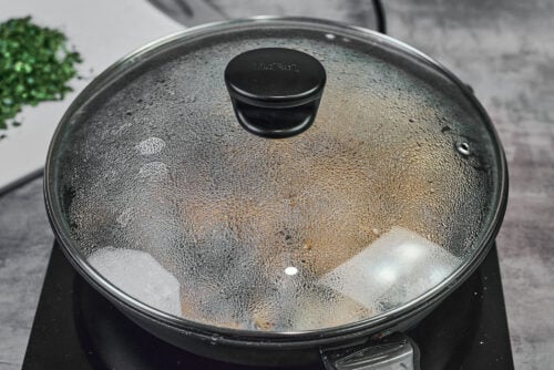 Covering beef stroganoff to rest off the heat