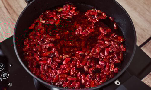 Step-by-step process of cooking red kidney beans in a pot – rinsed beans, covered with water