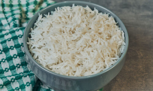 Fluffy cooked white rice served in a bowl