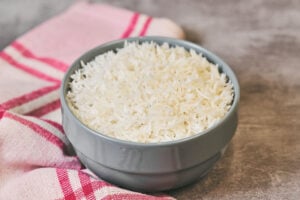 Fluffy white rice cooked on the stove
