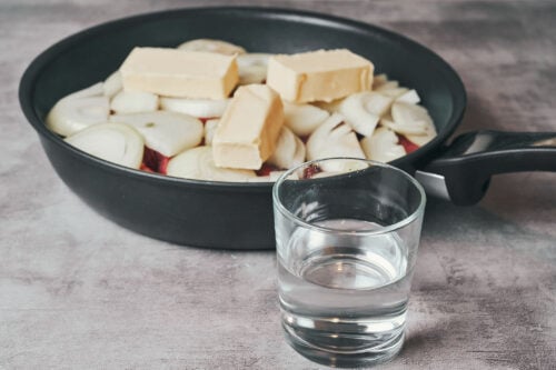 Water measured to add moisture for gentle simmering