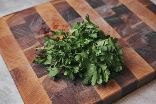 Fresh parsley on a wooden cutting board