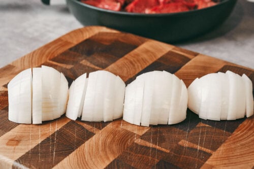 Onions sliced into half rings for slow simmered beef