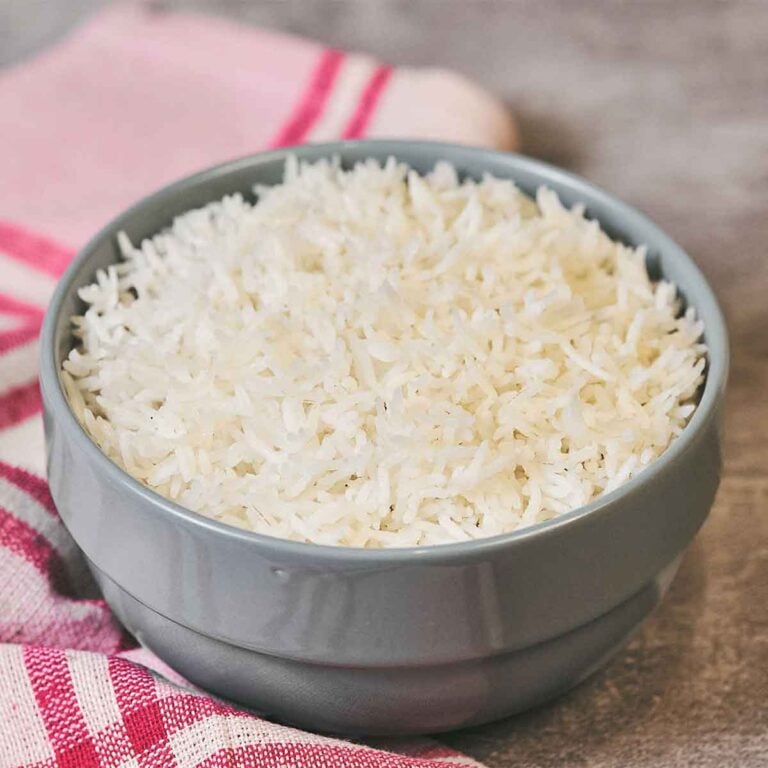 Fluffy white rice cooked on the stove