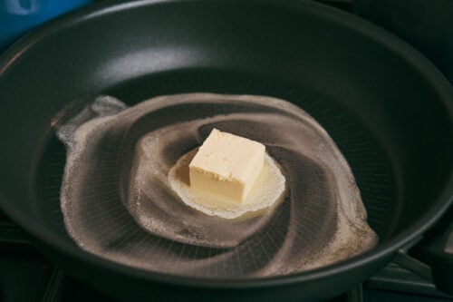 Butter melting in a hot skillet