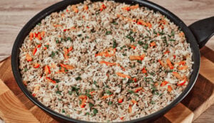 Rice with ground beef cooked in a skillet