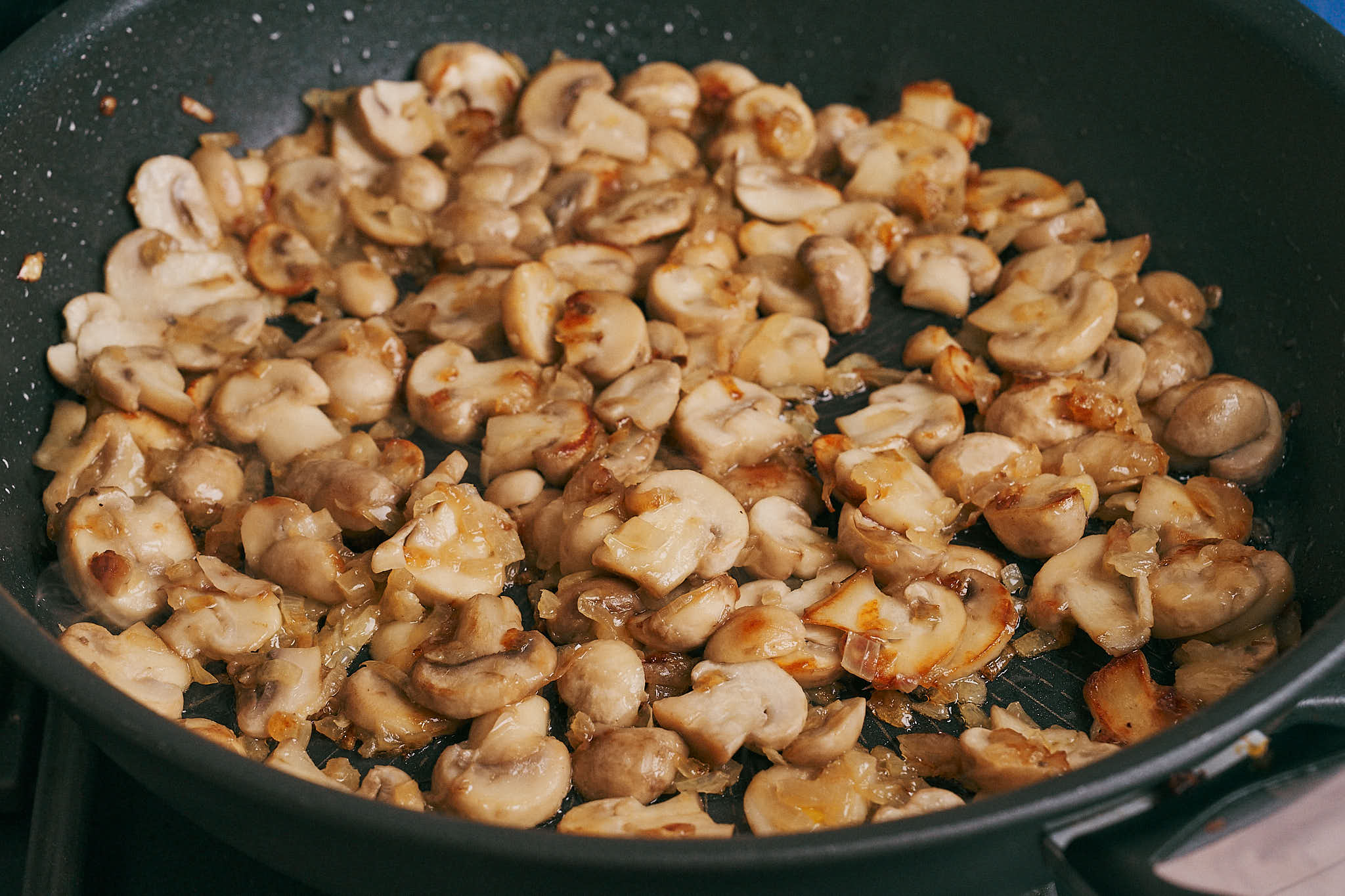 mushrooms lightly browned after moisture has cooked off