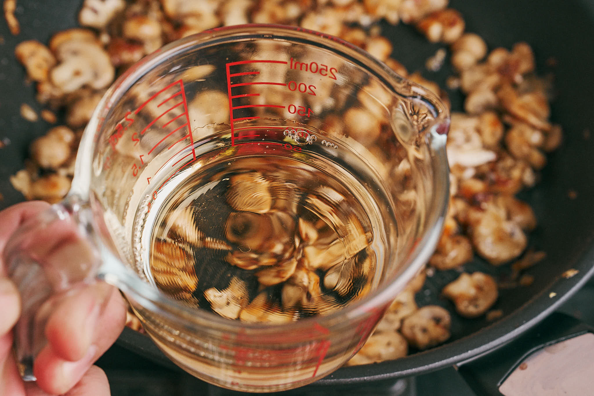 white wine added to mushrooms to deglaze the pan