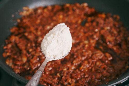 Adding flour to thicken the sauce
