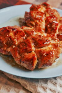 Juicy lemon honey butter chicken with golden chicken breast and glossy sauce