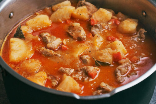 Stewed potatoes and pork finished cooking in a pot