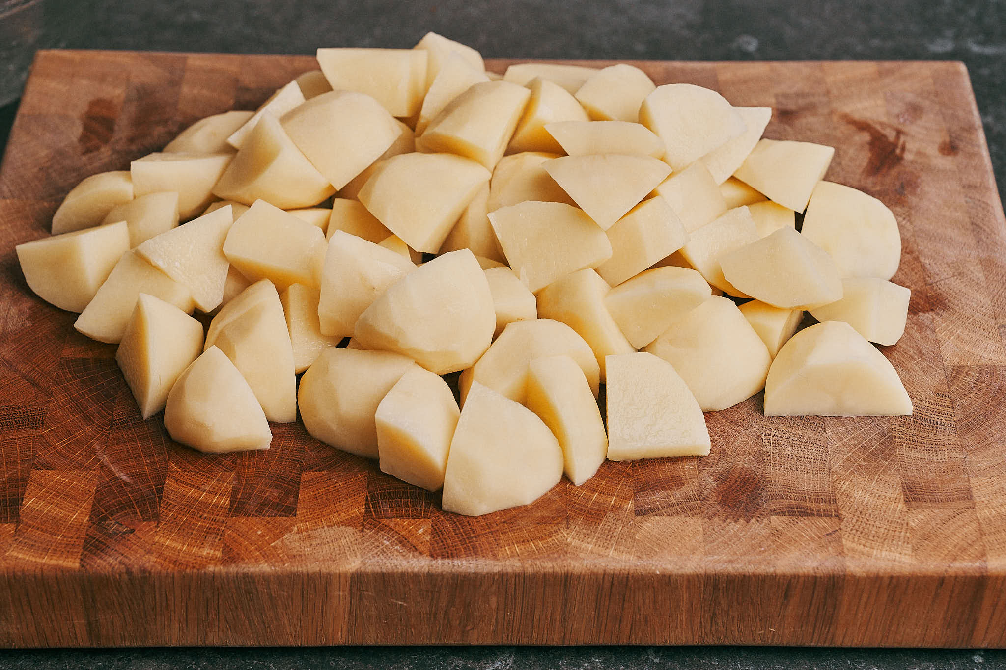 Cubed potatoes prepared for stewing with pork