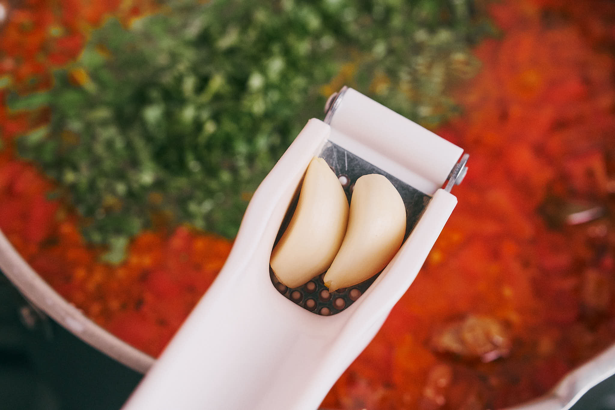 Fresh garlic and parsley added to beef soup at the end