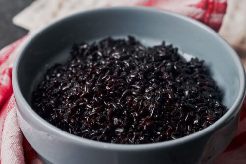 fluffy cooked black rice in a bowl