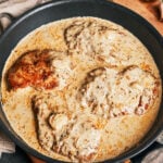 Creamy garlic chicken plated with tender chicken breast and rich garlic cream sauce