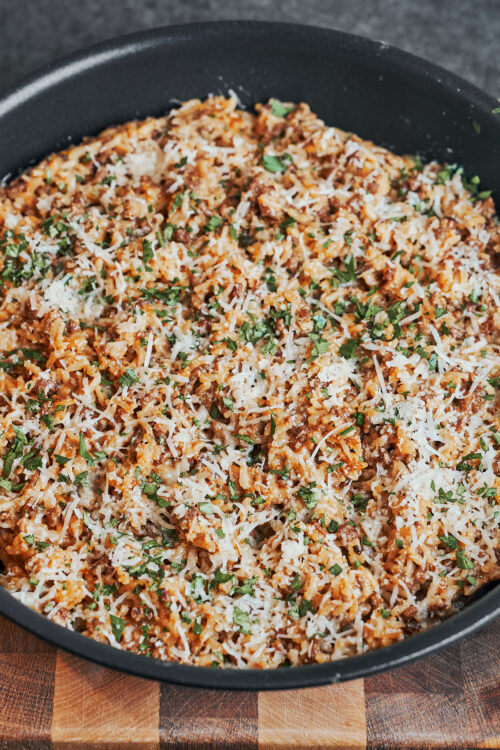 Creamy ground beef and rice topped with Parmesan and fresh parsley