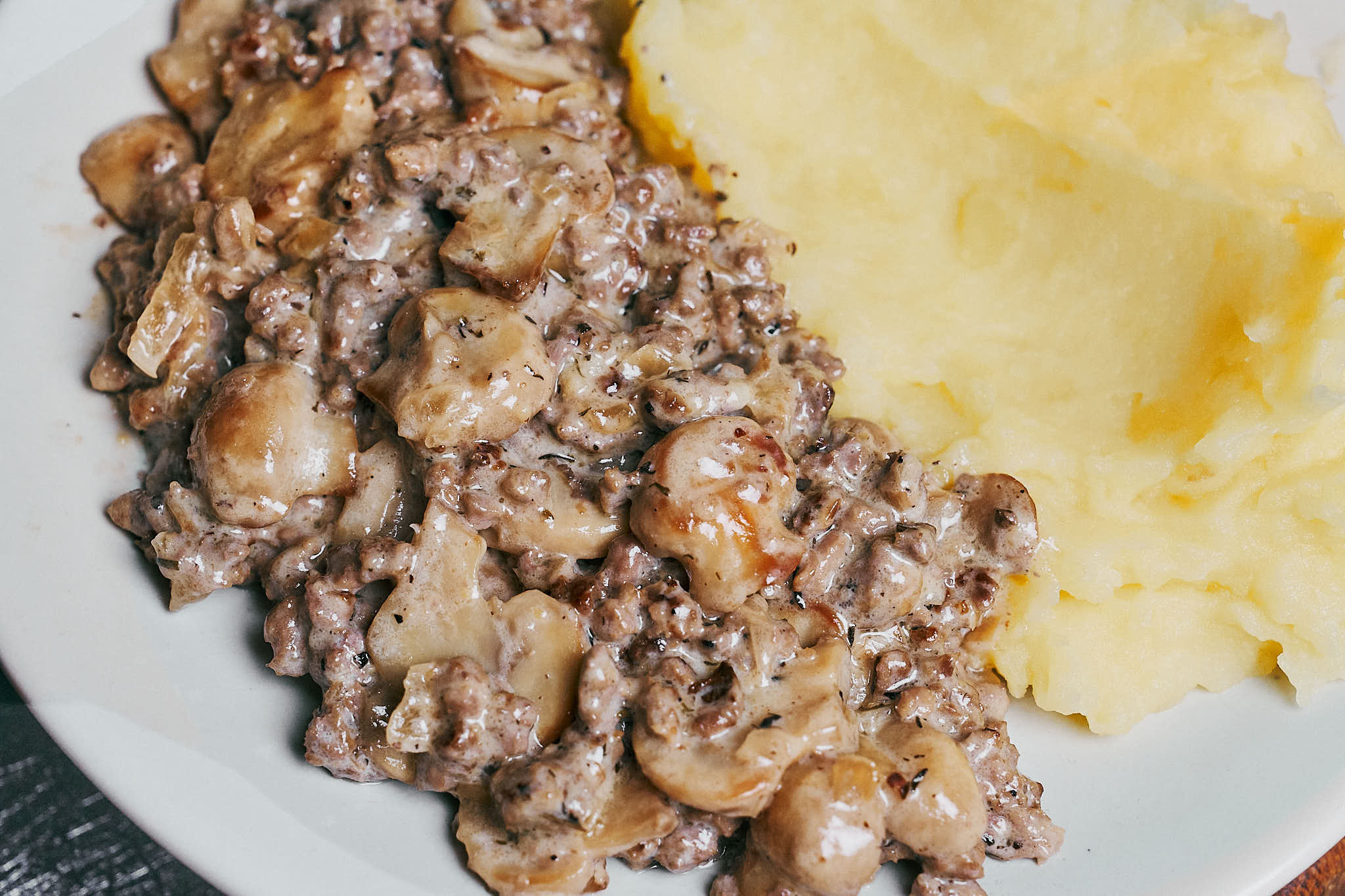 creamy ground beef mushroom gravy served with mashed potatoes