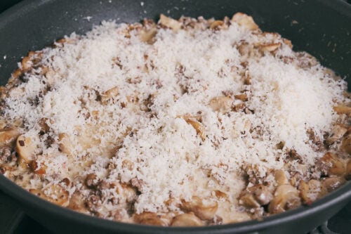 Parmesan added to creamy ground beef mushroom sauce