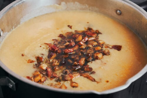 mushrooms and bacon stirred into creamy potato soup
