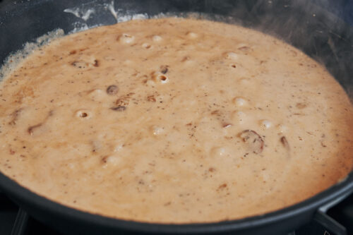 creamy mushroom sauce ready for the pork chops