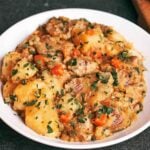 Stewed potatoes with pork shoulder cooked in a flavorful broth