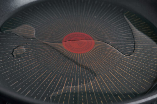 heating oil in skillet before cooking potatoes