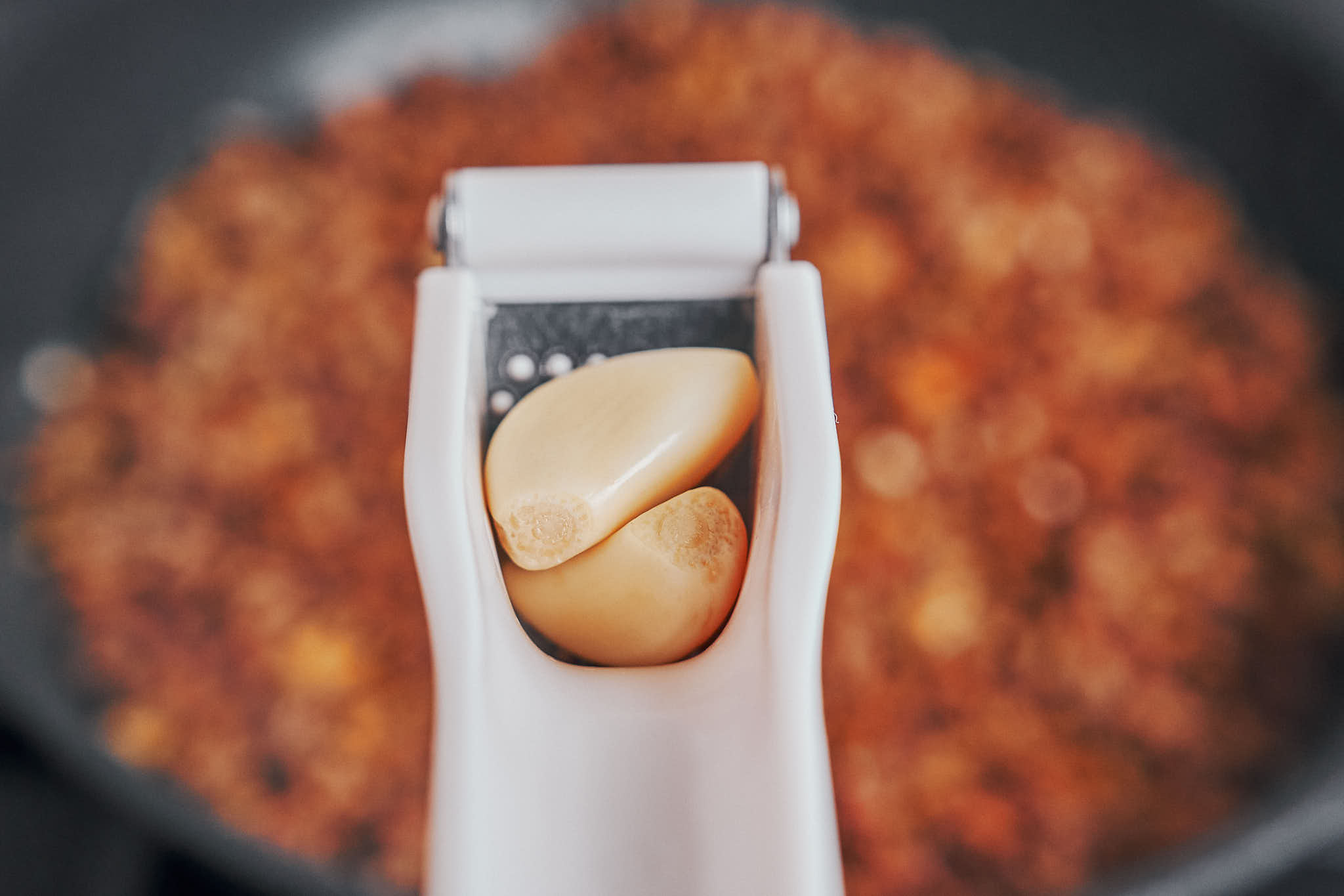 fresh garlic ready to be added to the ground beef skillet