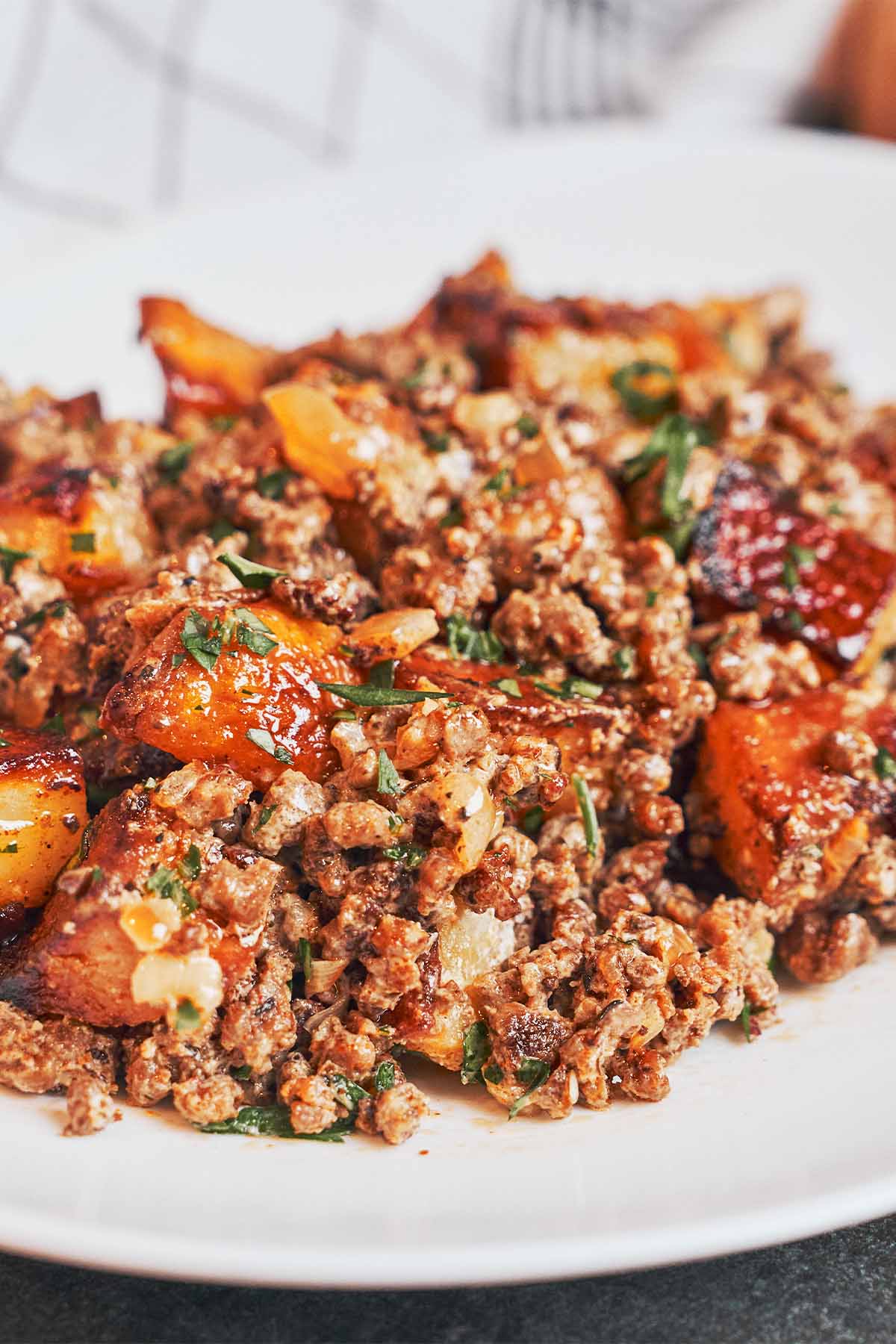 budget ground beef and potatoes served on a plate with crispy golden potatoes