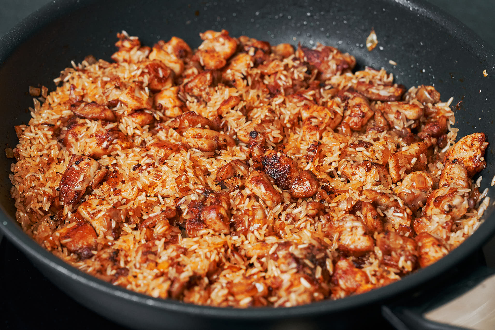 chicken and rice toasted together in a skillet