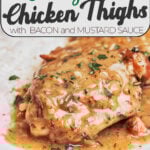 creamy chicken thighs with bacon mustard sauce served over rice on white plate
